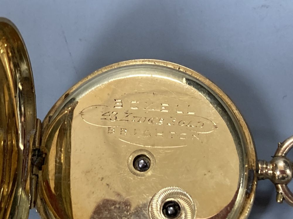 An early 20th century engine turned 18k and enamel(a.f.) keywind fob watch, case diameter 35mm, gross 29.2 grams.